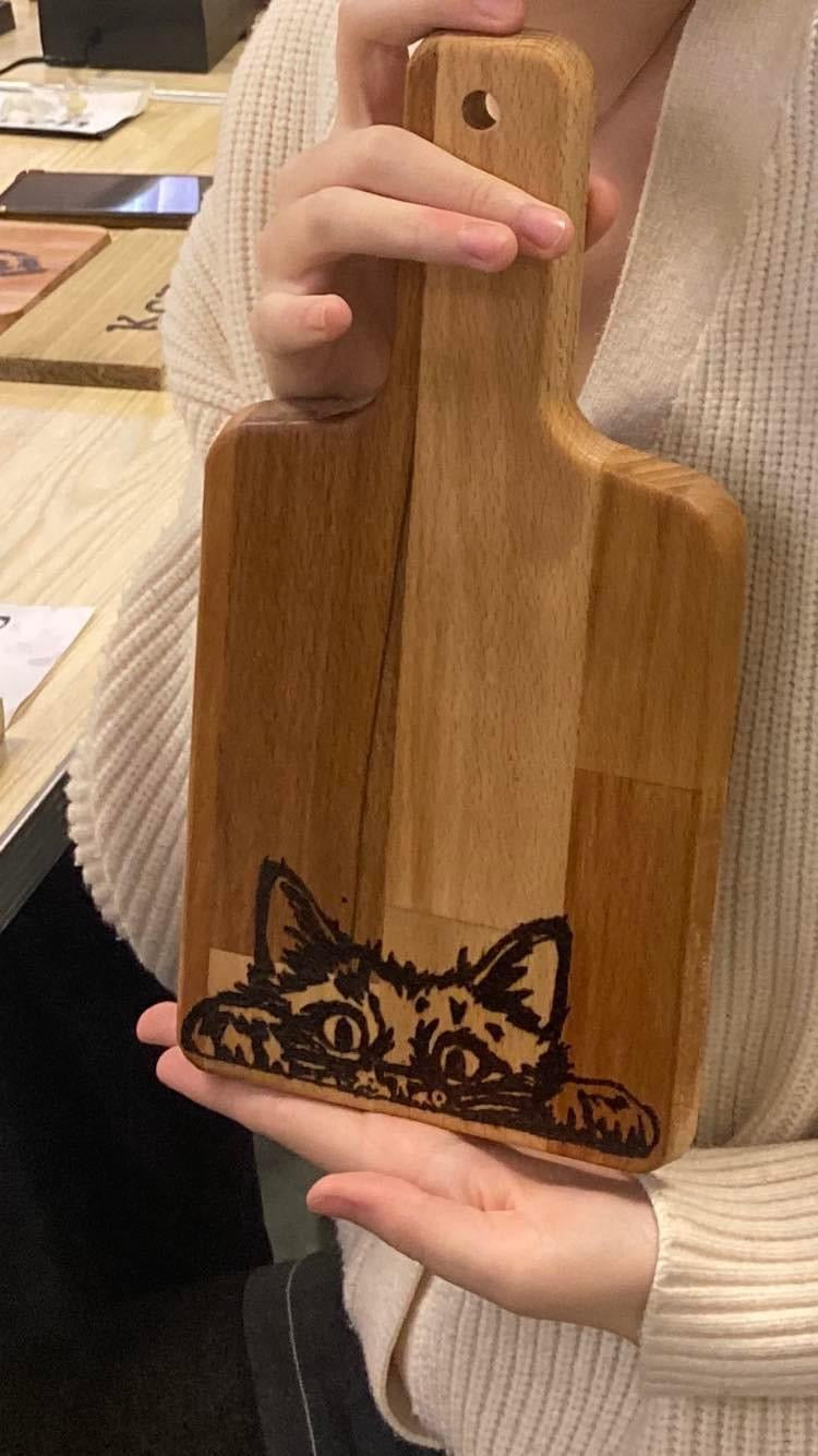 pyrography cat design created at side burner workshop